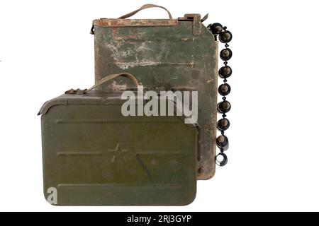 Ammo box with ammunition belt and 14.5mm cartridges for a 14.5mm KPVT heavy machine gun used by the former Soviet Union. Isolated on white background. Stock Photo