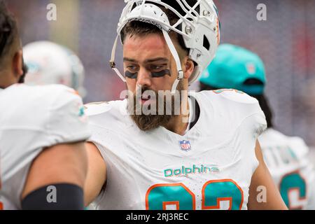 Miami Dolphins defensive tackle Zach Sieler (92) and Cleveland Browns guard  Wyatt Teller (77) exchange jerseys at the end of an NFL football game,  Sunday, Nov. 13, 2022, in Miami Gardens, Fla.