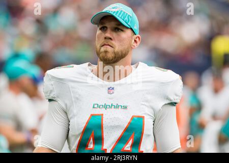 Miami Dolphins long snapper Blake Ferguson (44) stretches before