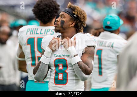 Miami Dolphins safety Jevon Holland (8) defends during an NFL