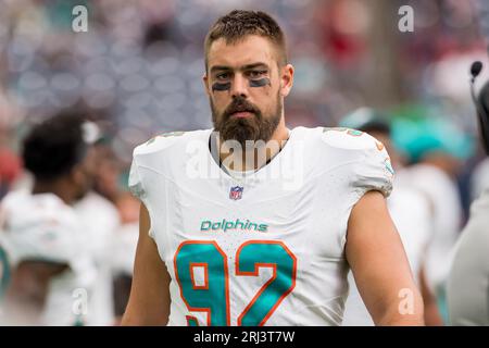 Miami Dolphins defensive tackle Zach Sieler (92) and Cleveland Browns guard  Wyatt Teller (77) exchange jerseys at the end of an NFL football game,  Sunday, Nov. 13, 2022, in Miami Gardens, Fla.