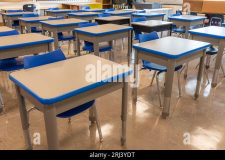 Example of an empty nondescript US High School Classroom with desks ...