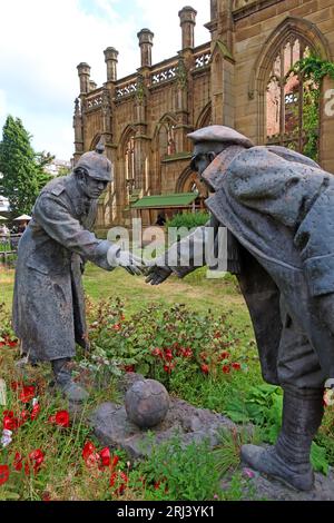 Christmas truce sculpture, known as 'All Together Now' by Andy Edwards, at St Lukes, the Bombed Out Church, Reece St, Liverpool, L1 2TR Stock Photo