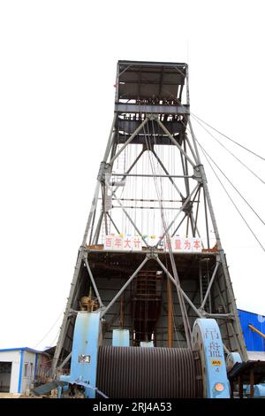 MaCheng July 12: Industrial stage winch for shaft sinking and drilling derrick in MaCheng iron mine on July 12, 2012, Luannan County, Hebei Province, Stock Photo