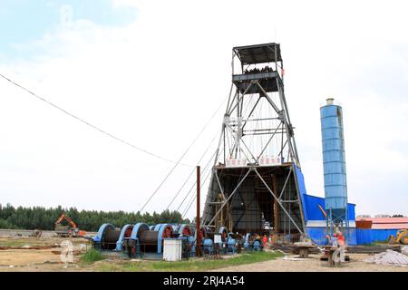 MaCheng July 12: Industrial stage winch for shaft sinking and drilling derrick in MaCheng iron mine on July 12, 2012, Luannan County, Hebei Province, Stock Photo