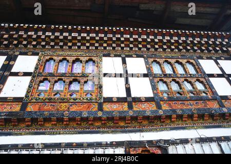 Parop Rabsel Traditional Bhutanese architecture featuring painted woodwork, banks of ...