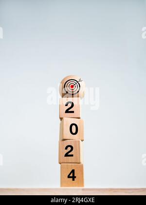 Wooden block numbers tower isolated on white background. Vertical ...