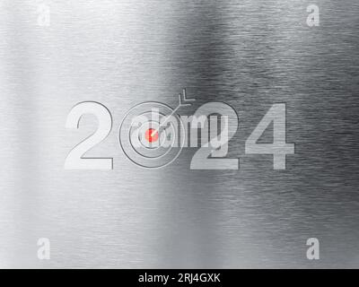Happy new year 2024 banner background. 2024 numbers year with target dart icon on shiny silver brushed stainless steel plate or aluminium background. Stock Photo