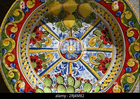 Traditional handmade Majolica ceramic plate with typical Sicilian motifs in Scicli Sicily, Italy. Stock Photo