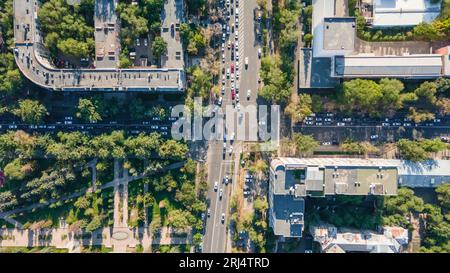 Almaty, Kazakhstan - August 17, 2023: Traffic jam on the street in the city center. Sunny day Stock Photo