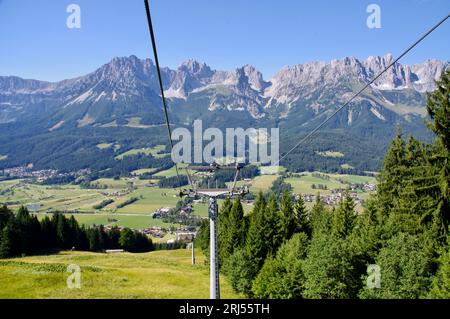 Going am Wilden Kaiser, Austria,  A view of Wilder Kaiser from an open chairlift. Stock Photo