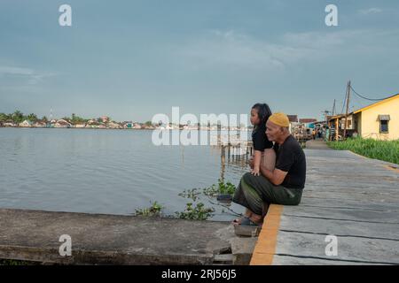 Pontianak, West Kalimantan, Indonesia, June 19, 2023: People's activities on the banks of the Kapuas river Stock Photo