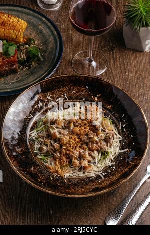 finnish gnocchi with meat and cheese on a plate Stock Photo