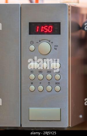 Microwave oven controls. technology in the kitchen. Stock Photo