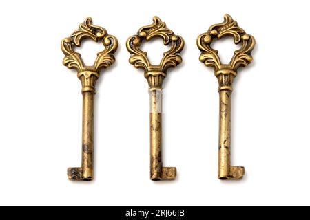 Ornate keys on a white background Stock Photo