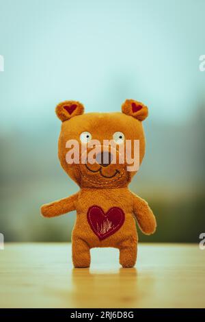 Teddy bear with cheap heart on chest cartoon