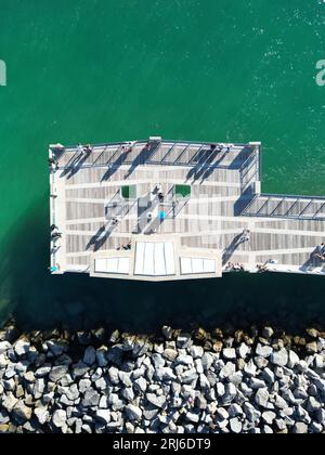 A birds-eye view of South Pointe Miami Beach, with a pier jutting out into the ocean Stock Photo