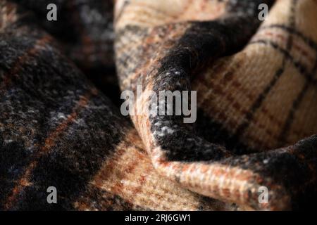 Soft checkered woolen cloth, fashion industry, cozy blanket in warm tones Stock Photo
