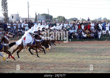 Tajura, Libya. 20th Aug, 2023. Two men dressed in traditional Libyan