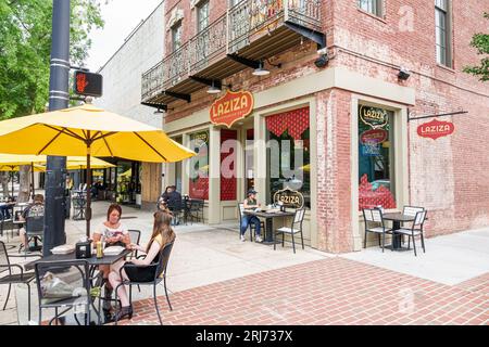 Augusta Georgia,Broad Street,James Brown Boulevard,Laziza Mediterranean Grill,woman women lady female,adult,residents,outside exterior,building front Stock Photo
