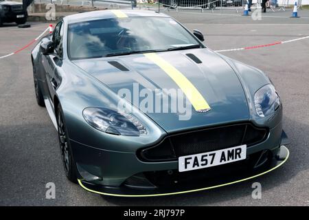 Three-quarters front view of a  Green, 2018, Aston Martin Vantage AMR, on display in the Supercar paddock, at the 2023 British Motor Show, Farnborough Stock Photo