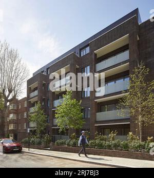 Oblique view of brick building. Wellington Road, London, United Kingdom. Architect: Alan Power Architects Ltd, 2022. Stock Photo