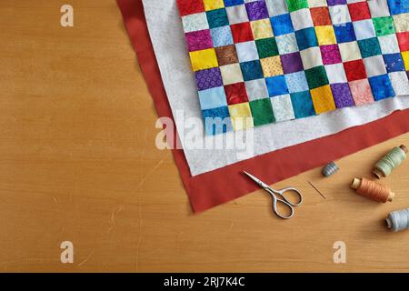 Process of quilt sandwich assembling, sewing accessories Stock Photo