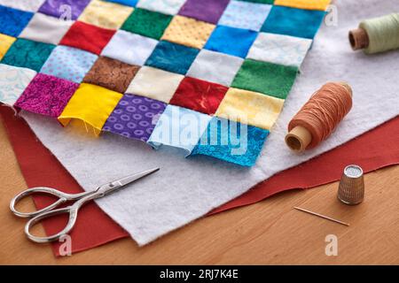 Process of quilt sandwich assembling, sewing accessories Stock Photo