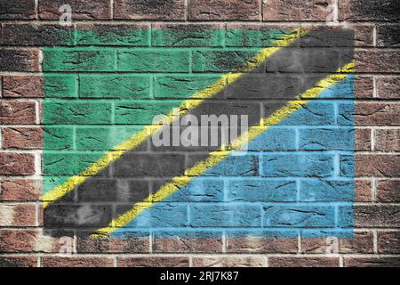 Tanzania flag on a brick wall background Stock Photo