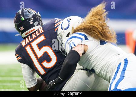 Chicago Bears quarterback PJ Walker (15) throws the ball during the first  half of an NFL football game against the Tennessee Titans, Saturday, Aug.  12, 2023, in Chicago. (AP Photo/Melissa Tamez Stock