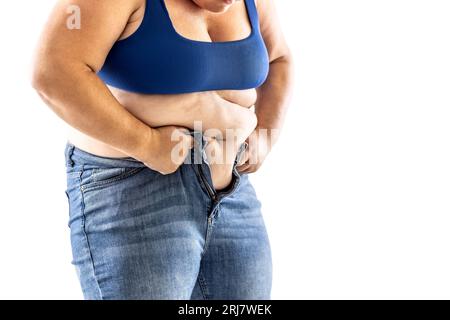Woman With Belly Fat Getting Dressed Putting Pants On. Overweight