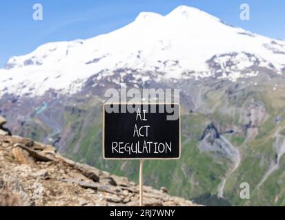 AI act regulation symbol. Concept words AI artificial intelligence act regulation on beautiful chalk blackboard. Beautiful mountain Elbrus background. Stock Photo