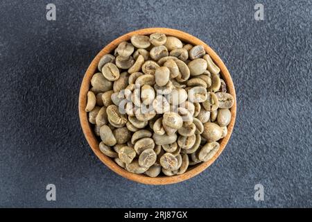 A bowl full of green coffee beans,top view Stock Photo