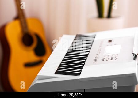 Modern synthesizer in room, closeup Stock Photo