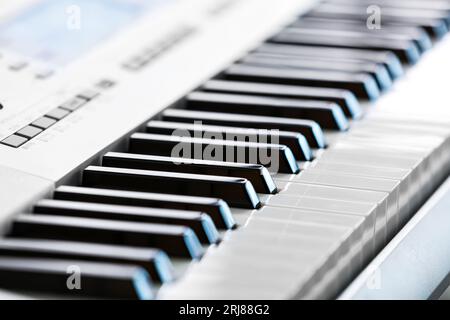 Modern synthesizer in room, closeup Stock Photo