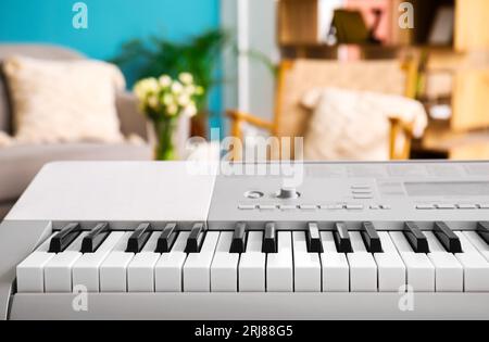 Modern synthesizer in room, closeup Stock Photo