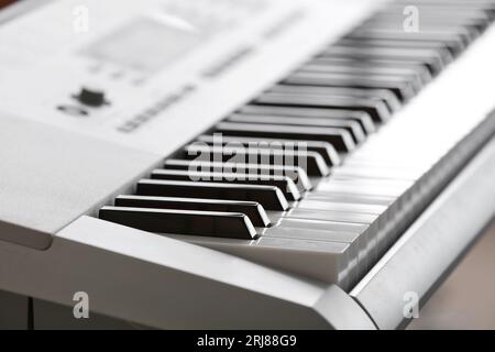 Modern synthesizer in room, closeup Stock Photo