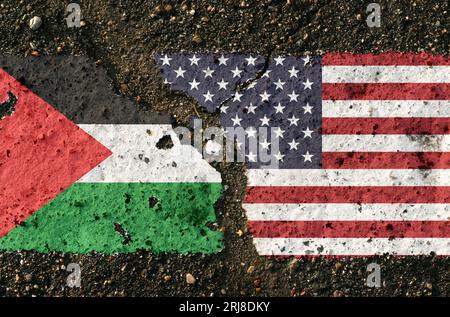 On the pavement are images of the flags of Palestine and the United States, as a symbol of confrontation. Conceptual image. Stock Photo