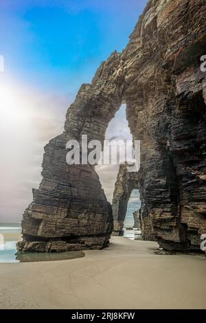 Famous eroded arches of Las Catedrales beach in Ribadeo, Lugo, Galicia, Spain Stock Photo