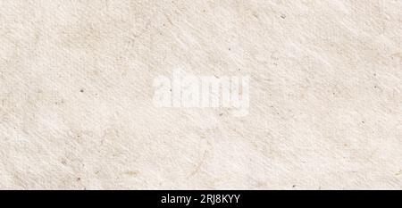 Textured beige wrinkled handmade paper background. Horizontal banner, background for design Stock Photo