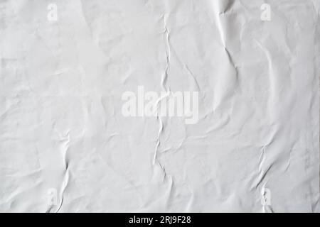White poster texture adhered by wheat paste Stock Photo