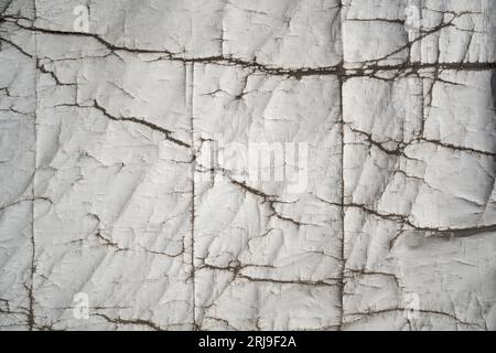 Damaged white canvas texture background Stock Photo