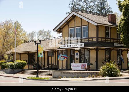 Danville, California, USA - April 16, 2023: Afternoon sun shines on the historic train depot that is the Museum of the San Ramon Valley. Stock Photo