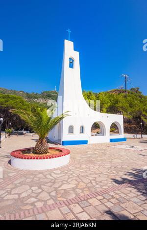 White church in Potami beach with azure sea water, Samos island, Greece Stock Photo