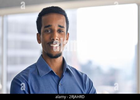 Confident happy young African American business man headshot close up portrait. Stock Photo