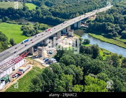 Grimma, Germany. 22nd Aug, 2023. View of the construction site for the replacement of the Mulde bridge on the A14. The new construction is to replace the old bridge from the 1970s, according to the trunk road construction company Deges. The new bridge is to be 361 meters long. Like the existing one, it will also cross the Mulde River at around 21 meters, but with fewer bridge piers. The project costs of 81 million euros are being borne by the federal government. Completion is planned for 2027. (Aerial photo with drone) Credit: Jan Woitas/dpa/Alamy Live News Stock Photo