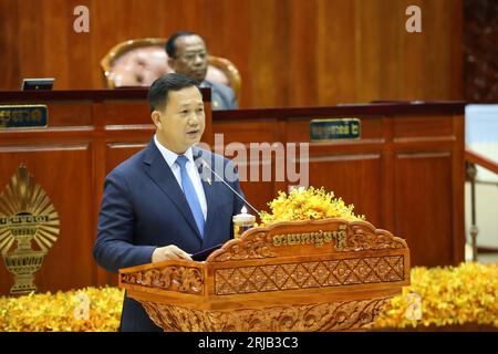 (230822) -- PHNOM PENH, Aug. 22, 2023 (Xinhua) -- Newly elected Cambodian Prime Minister Hun Manet speaks during a parliamentary session in Phnom Penh, Cambodia on Aug. 22, 2023. Cambodia's National Assembly on Tuesday confirmed Hun Manet as the new prime minister for a five-year term after his ruling Cambodian People's Party (CPP) won a landslide victory in the July 23 general election, according to the state-run National Television of Cambodia (TVK). Credit: Xinhua/Alamy Live News Stock Photo