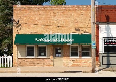 Malta, Illinois - United States - August 15th, 2023: Exterior of the Village of Malta building on a sunny Summer morning. Stock Photo