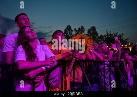 LVIV, UKRAINE - AUGUST 17, 2023 - Spectators watch the performances during the Champagne Nights Music Festival held in remembrance of Andriy Kuzmenko, the lead singer of the Ukrainian rock band Skryabin, on the 55th birthday anniversary of the musician. Ukrainian singer, poet, writer, TV presenter, producer and actor, Hero of Ukraine Andriy Kuzmenko, also known as Kuzma or Kuzma Skryabin, died in a car accident in Lozuvatka, Dnipropetrovsk Region, on February 2, 2015, aged 46.NO USE RUSSIA. NO USE BELARUS. (Photo by Ukrinform/NurPhoto) Stock Photo