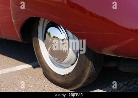 Waltershausen, Germany - June 10, 2023: A vintage IFA F9. View of the wheel with the logo. Stock Photo